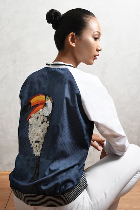 Shop Richaa Goenka Blue Cotton Print Paisley Round Collar Toucan Sequin Embroidered Bomber Jacket at Aza Fashions Shop_Richaa Goenka_Blue Cotton Print Paisley Round Collar Toucan Sequin Embroidered Bomber Jacket _at_Aza_Fashions
