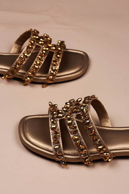 PHENOMINAAL_Gold Crystals Embellished Flat Sandals _at_Aza_Fashions