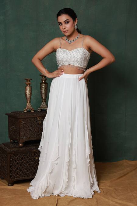 Pooja Kankariya_Off White Georgette, Bay Salt Ruffled Shackle Lehenga With Embroidered Blouse _Online_at_Aza_Fashions