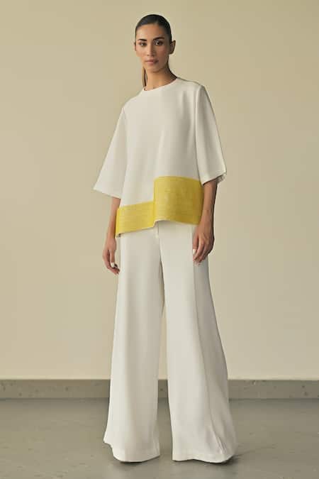 Somya Goyal_White Microfibre Faille- 95% Landscape Hem Top And Stella Flared Trouser Set_Online_at_Aza_Fashions