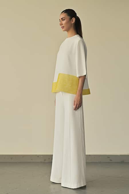 Shop_Somya Goyal_White Microfibre Faille- 95% Landscape Hem Top And Stella Flared Trouser Set_Online_at_Aza_Fashions