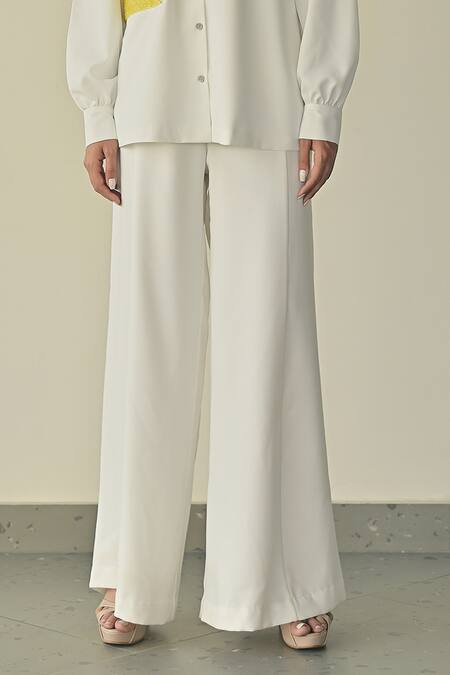 Somya Goyal_White Microfibre Faille- 95% Placement Shirt And Stella Flared Trouser Set_Online_at_Aza_Fashions