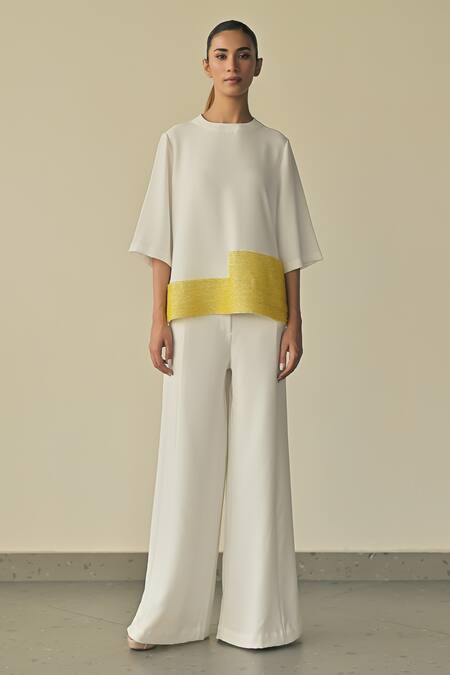 Somya Goyal_White Microfibre Faille- 95% Solid Stella Flared Trouser _Online_at_Aza_Fashions