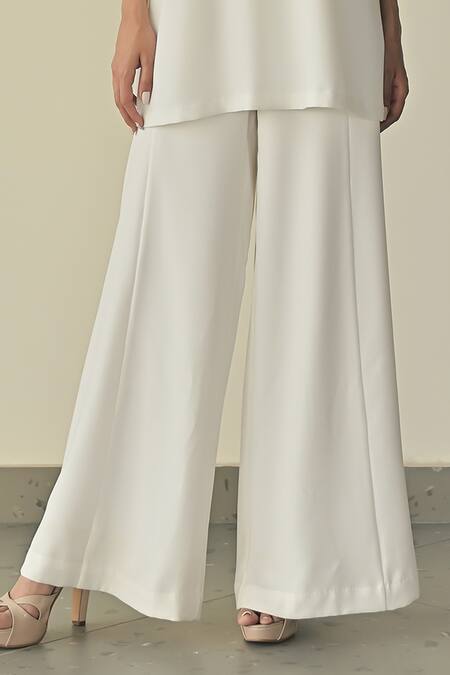 Somya Goyal_White Microfibre Faille- 95% Solid Stella High-waisted Flared Trouser_Online_at_Aza_Fashions