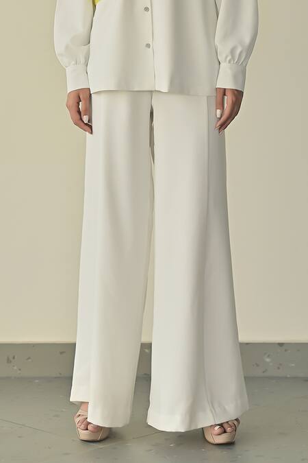 Buy_Somya Goyal_White Microfibre Faille- 95% Solid Stella Flared Trouser _Online_at_Aza_Fashions