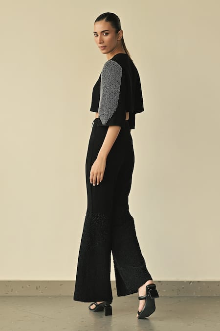 Shop_Somya Goyal_Black 95% Viscose Blend Solid Gradated Bell Bottom Trouser_at_Aza_Fashions