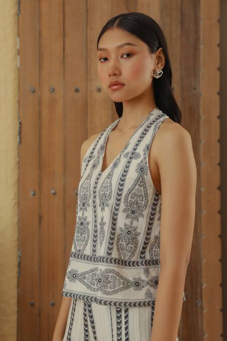 Muvazo White Cotton Mirrors, Embroidery Halter Neck Paisley Print Top at Aza Fashions Muvazo_White Cotton Mirrors, Embroidery Halter Neck Paisley Print Top _at_Aza_Fashions