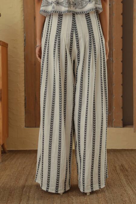 Shop_Muvazo_White Cotton Dobby Printed Chevron Pleated Pant _at_Aza_Fashions