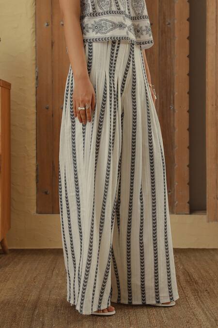 Shop_Muvazo_White Cotton Dobby Printed Chevron Pleated Pant _Online_at_Aza_Fashions