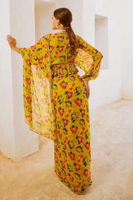 Shop Pallavi Jaipur Green Chiffon Beads, Fringe V-neck Poppy Planet Print Saree With Frilled Blouse at Aza Fashions Shop_Pallavi Jaipur_Green Chiffon Beads, Fringe V-neck Poppy Planet Print Saree With Frilled Blouse _at_Aza_Fashions