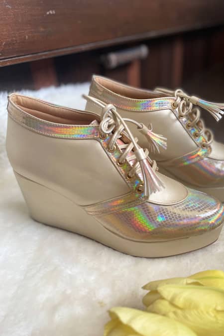 Shop Modanta Footwear Gold Rainbow Sneaker Wedges at Aza Fashions Shop_Modanta Footwear_Gold Rainbow Sneaker Wedges _at_Aza_Fashions