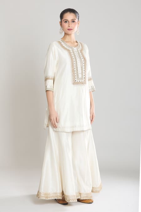 Siyona By Ankurita Ivory Kurta And Gharara Pure Chanderi Silk Embroidered Mirror & Thread Set Online at Aza Fashions Siyona By Ankurita_Ivory Kurta And Gharara Pure Chanderi Silk Embroidered Mirror & Thread Set _Online_at_Aza_Fashions