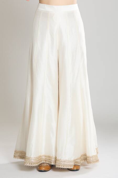 Siyona By Ankurita Ivory Kurta And Gharara Pure Chanderi Silk Embroidered Mirror & Thread Set at Aza Fashions Siyona By Ankurita_Ivory Kurta And Gharara Pure Chanderi Silk Embroidered Mirror & Thread Set _at_Aza_Fashions