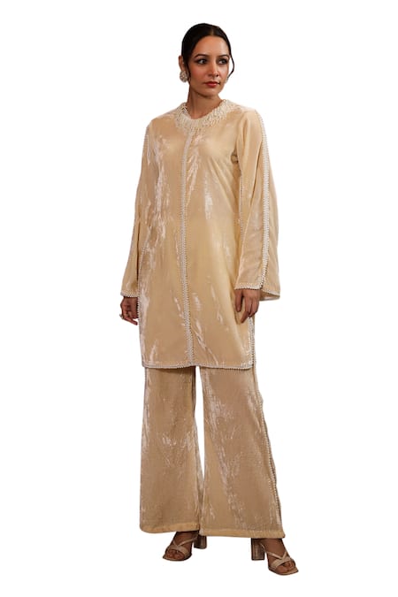 Shop K-Anshika Off White Velvet Beads Round Neck Embellished Kurta And Flared Pant Set Online at Aza Fashions Shop_K-Anshika_Off White Velvet Beads Round Neck Embellished Kurta And Flared Pant Set _Online_at_Aza_Fashions