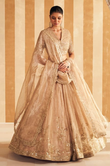 Shop_Ridhi Mehra_Gold Net, Tissue Sequins, Beads, Zari V-neck Floral Embroidered Lehenga Set _Online_at_Aza_Fashions
