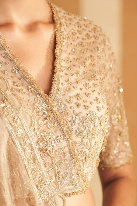 Shop_Ridhi Mehra_Gold Net, Tissue Sequins, Beads, Zari V-neck Floral Embroidered Lehenga Set 