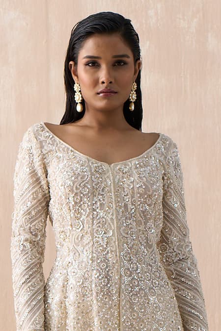 Saisha Ivory Organza, Satin Pearls, Floral Embellished Peplum Kurta With Sharara Online at Aza Fashions Saisha_Ivory Organza, Satin Pearls, Floral Embellished Peplum Kurta With Sharara _Online_at_Aza_Fashions