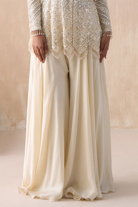 Buy Saisha Ivory Organza, Satin Pearls, Floral Embellished Peplum Kurta With Sharara Online at Aza Fashions Buy_Saisha_Ivory Organza, Satin Pearls, Floral Embellished Peplum Kurta With Sharara _Online_at_Aza_Fashions