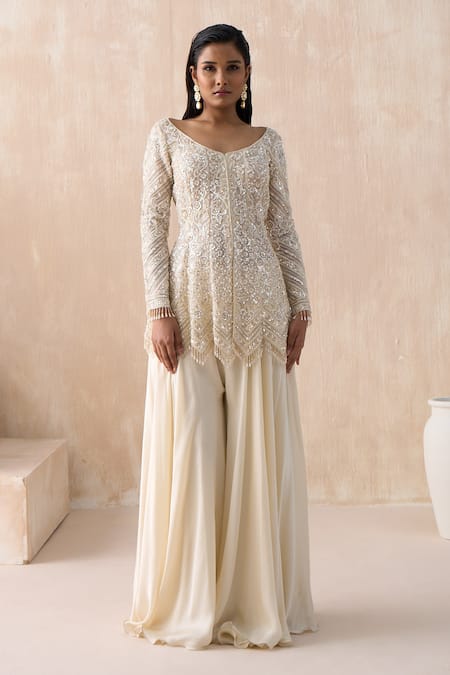 Saisha Ivory Organza, Satin Pearls, Floral Embellished Peplum Kurta With Sharara at Aza Fashions Saisha_Ivory Organza, Satin Pearls, Floral Embellished Peplum Kurta With Sharara _at_Aza_Fashions