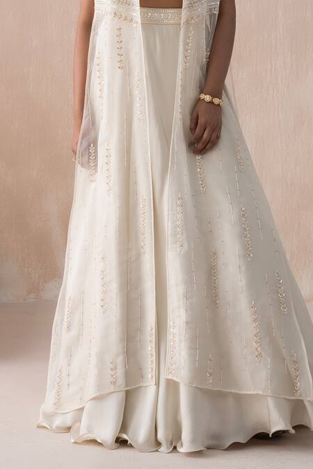 Saisha Ivory Organza, Satin Pearls, Sequins, Beads Open Embellished Jacket Lehenga Set Online at Aza Fashions Saisha_Ivory Organza, Satin Pearls, Sequins, Beads Open Embellished Jacket Lehenga Set _Online_at_Aza_Fashions
