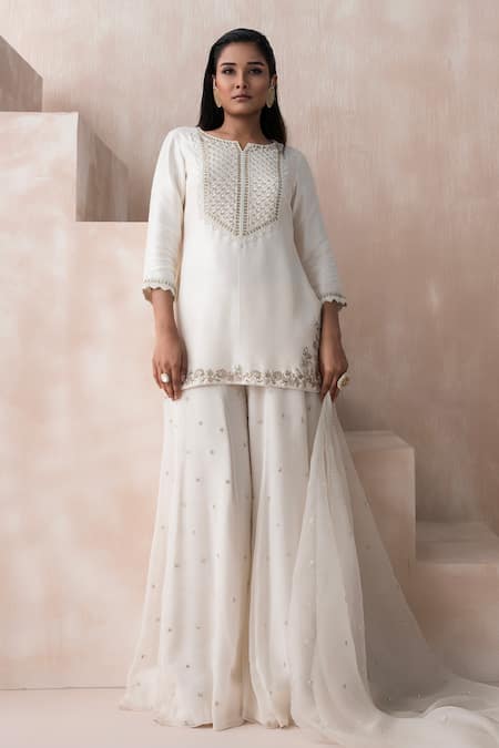 Shop Saisha Ivory Georgette, Silk, Organza Sequins, Floral Embellished Kurta Sharara Set at Aza Fashions Shop_Saisha_Ivory Georgette, Silk, Organza Sequins, Floral Embellished Kurta Sharara Set _at_Aza_Fashions