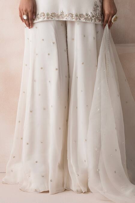 Saisha Ivory Georgette, Silk, Organza Sequins, Floral Embellished Kurta Sharara Set Online at Aza Fashions Saisha_Ivory Georgette, Silk, Organza Sequins, Floral Embellished Kurta Sharara Set _Online_at_Aza_Fashions