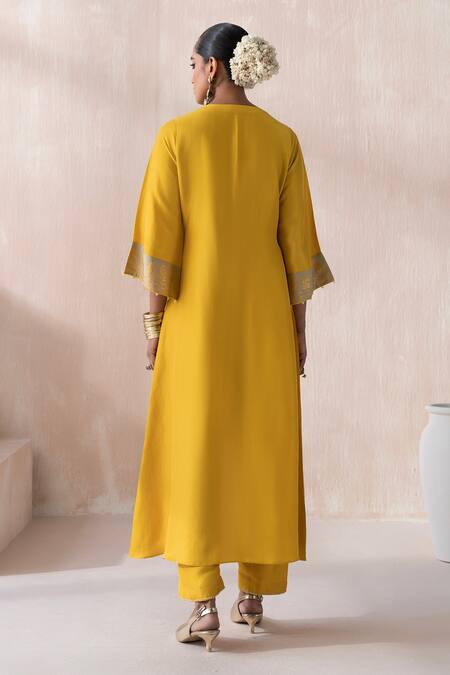 Shop_Saisha_Yellow Chinese Silk Embellished Floral Vine Embroidered High-low Kurta Pant Set _at_Aza_Fashions