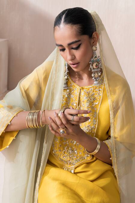 Saisha_Yellow Chinese Silk Embellished Floral Vine Embroidered High-low Kurta Pant Set _at_Aza_Fashions