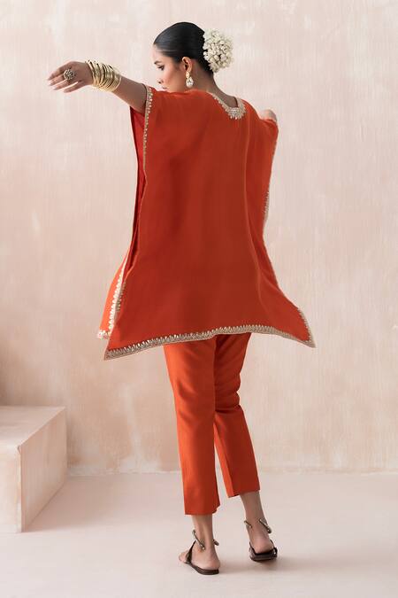 Shop Saisha Orange Silk Gota Patti, Sequins Split V-neck Embroidered Kaftan With Pant at Aza Fashions Shop_Saisha_Orange Silk Gota Patti, Sequins Split V-neck Embroidered Kaftan With Pant _at_Aza_Fashions