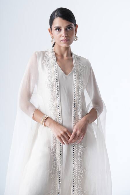 Saisha Ivory Organza, Silk Mirrors, Sequins, Embroidery, Floral Placket Cape Pant Set Online at Aza Fashions Saisha_Ivory Organza, Silk Mirrors, Sequins, Embroidery, Floral Placket Cape Pant Set _Online_at_Aza_Fashions