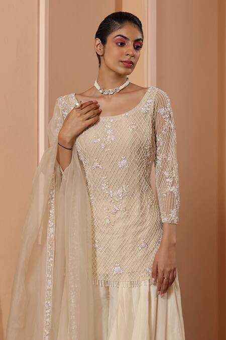 Saisha Ivory Net, Silk Sequins, Beads, Checkered Embellished Kurta Sharara Set Online at Aza Fashions Saisha_Ivory Net, Silk Sequins, Beads, Checkered Embellished Kurta Sharara Set _Online_at_Aza_Fashions