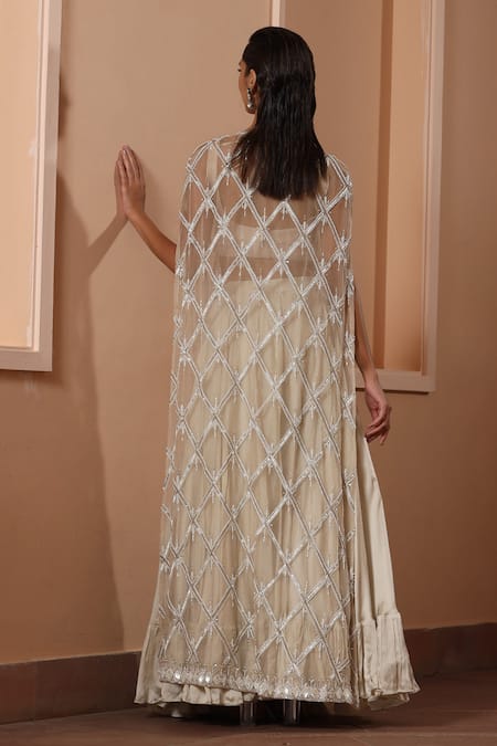 Shop Saisha Ivory Satin, Organza Sequins, Cut Work Checkered Embroidered Jacket Lehenga Set at Aza Fashions Shop_Saisha_Ivory Satin, Organza Sequins, Cut Work Checkered Embroidered Jacket Lehenga Set _at_Aza_Fashions