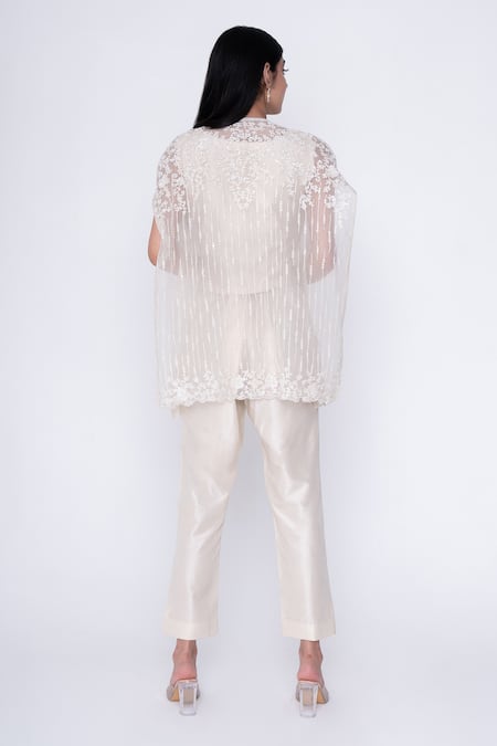 Shop Saisha Ivory Organza, Silk Sequins, Beads Round Floral Stripe Embroidered Cape Pant Set at Aza Fashions Shop_Saisha_Ivory Organza, Silk Sequins, Beads Round Floral Stripe Embroidered Cape Pant Set _at_Aza_Fashions