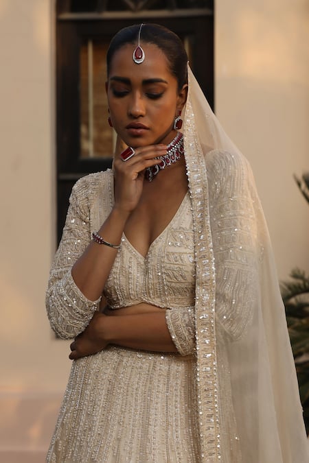 Buy Saisha Ivory Organza, Silk Sequins, Cut Work V-neck Embroidered Bridal Lehenga Set Online at Aza Fashions Buy_Saisha_Ivory Organza, Silk Sequins, Cut Work V-neck Embroidered Bridal Lehenga Set _Online_at_Aza_Fashions