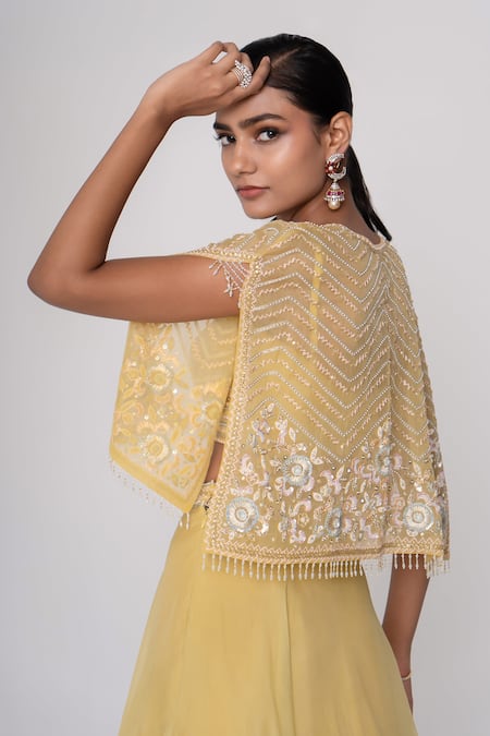 Shop Saisha Yellow Organza, Silk Sequins, Beads Floral Embroidered Short Cape And Skirt Set at Aza Fashions Shop_Saisha_Yellow Organza, Silk Sequins, Beads Floral Embroidered Short Cape And Skirt Set _at_Aza_Fashions