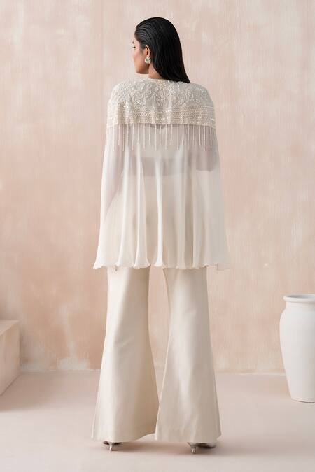 Shop Saisha Ivory Georgette, Silk Embroidery, Sequins Round Tonal Floral Cape And Pant Set at Aza Fashions Shop_Saisha_Ivory Georgette, Silk Embroidery, Sequins Round Tonal Floral Cape And Pant Set _at_Aza_Fashions