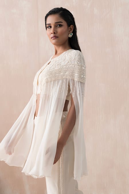 Shop Saisha Ivory Georgette, Silk Embroidery, Sequins Round Tonal Floral Cape And Pant Set Online at Aza Fashions Shop_Saisha_Ivory Georgette, Silk Embroidery, Sequins Round Tonal Floral Cape And Pant Set _Online_at_Aza_Fashions