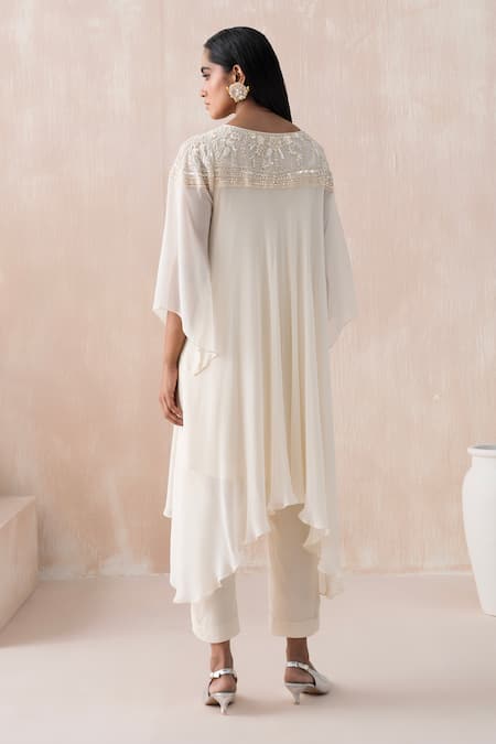 Shop Saisha Ivory Georgette Embroidery, Sequins Round Neck Floral Yoke Tunic With Pant at Aza Fashions Shop_Saisha_Ivory Georgette Embroidery, Sequins Round Neck Floral Yoke Tunic With Pant _at_Aza_Fashions