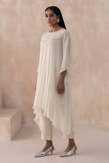 Buy Saisha Ivory Georgette Embroidery, Sequins Round Neck Floral Yoke Tunic With Pant Online at Aza Fashions Buy_Saisha_Ivory Georgette Embroidery, Sequins Round Neck Floral Yoke Tunic With Pant _Online_at_Aza_Fashions