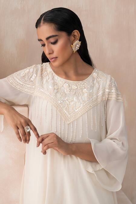 Shop Saisha Ivory Georgette Embroidery, Sequins Round Neck Floral Yoke Tunic With Pant Online at Aza Fashions Shop_Saisha_Ivory Georgette Embroidery, Sequins Round Neck Floral Yoke Tunic With Pant _Online_at_Aza_Fashions