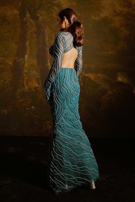 Shop SAANJH BY LEA Green Satin, Chiffon Pearls, Beads Meera Synodic Wave Embellished Lehenga Set at Aza Fashions Shop_SAANJH BY LEA_Green Satin, Chiffon Pearls, Beads Meera Synodic Wave Embellished Lehenga Set _at_Aza_Fashions