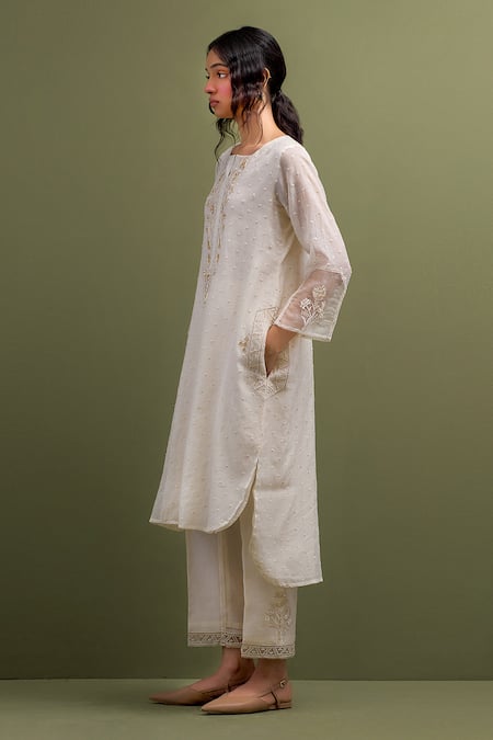 Shop Anantaa By Roohi Ivory Chanderi Sequins, Embroidery Split V-neck Thread High Low Kurta With Pant Online at Aza Fashions Shop_Anantaa By Roohi_Ivory Chanderi Sequins, Embroidery Split V-neck Thread High Low Kurta With Pant _Online_at_Aza_Fashions