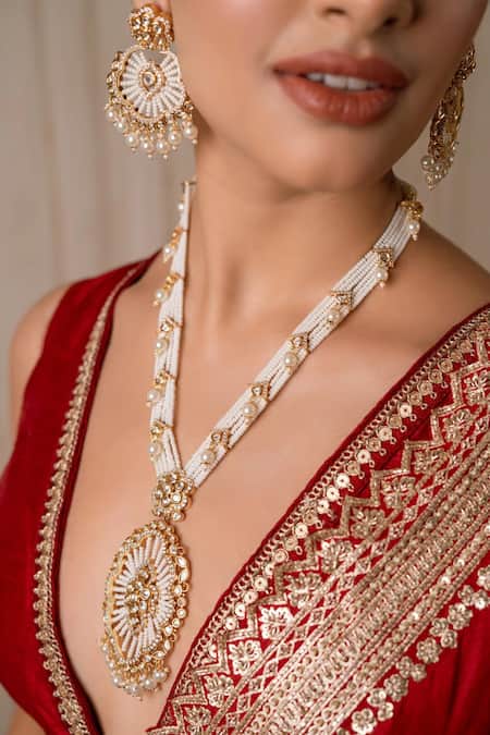 Shop_Anana_Gold Plated Beads, Metallic Thread Mishika Mughal Carved Pendant Necklace Set _at_Aza_Fashions