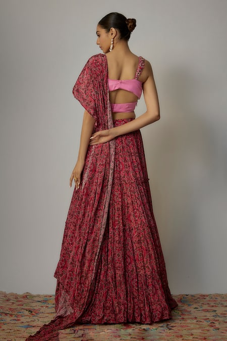 Shop Vana Ethnics Pink Viscose Embroidery Split V-neck Floral Embellished Blouse With Lehenga at Aza Fashions Shop_Vana Ethnics_Pink Viscose Embroidery Split V-neck Floral Embellished Blouse With Lehenga _at_Aza_Fashions