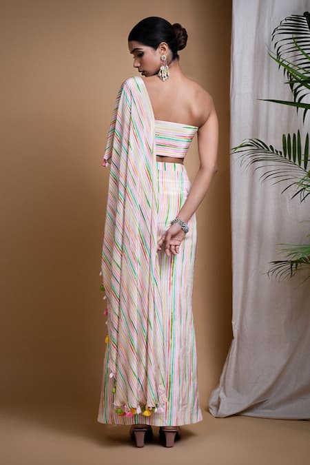 Shop Ahi Clothing White Crepe Fringe Sweetheart Linear Digital Print Draped Skirt With Bustier at Aza Fashions Shop_Ahi Clothing_White Crepe Fringe Sweetheart Linear Digital Print Draped Skirt With Bustier _at_Aza_Fashions