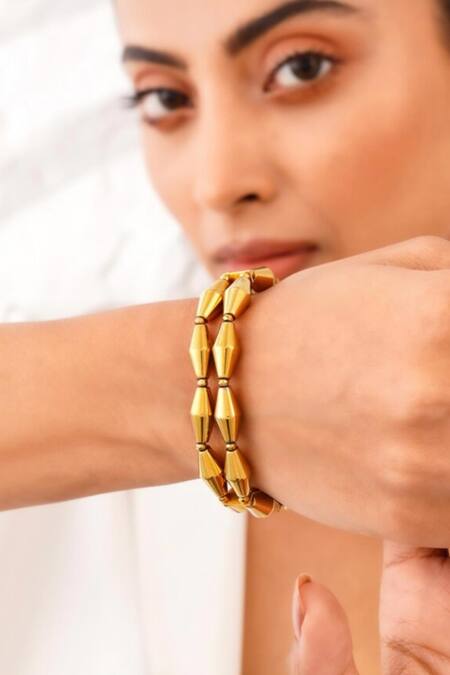 Kastiya Jewels_Gold Plated Stones Natural Hematite Embellished Bracelet_at_Aza_Fashions