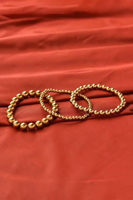 Kastiya Jewels_Gold Plated Toned Stack Bracelet Embellished With Natural Hematite_Online_at_Aza_Fashions