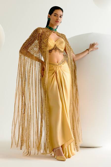 Buy Shashank Arya Gold Satin, Georgette Beads, Crystals Embellished Cape Dhoti Skirt Set Online at Aza Fashions Buy_Shashank Arya_Gold Satin, Georgette Beads, Crystals Embellished Cape Dhoti Skirt Set _Online_at_Aza_Fashions