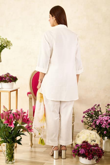 Shop Rainas Beige Chiffon, Cotton, Linen Tassels Collared Sunflower Print Shirt Pant Set at Aza Fashions Shop_Rainas_Beige Chiffon, Cotton, Linen Tassels Collared Sunflower Print Shirt Pant Set_at_Aza_Fashions