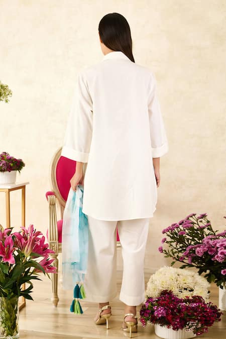 Shop_Rainas_White Chiffon, Linen Tassels, Embroidery Collared Flower Print Shirt Pant Set_at_Aza_Fashions